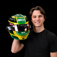 Thumbnail for Oscar Piastri holding Bell 2026 Australian GP 1:2 scale mini helmet
