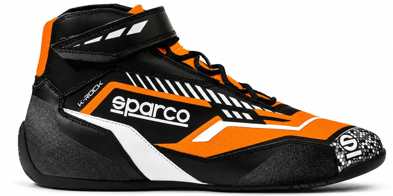 Sparco K-Rock kart racing shoe in black and orange, shown in a straight right-facing side view on a white background.